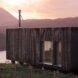 elongated timber home looking out over landscape