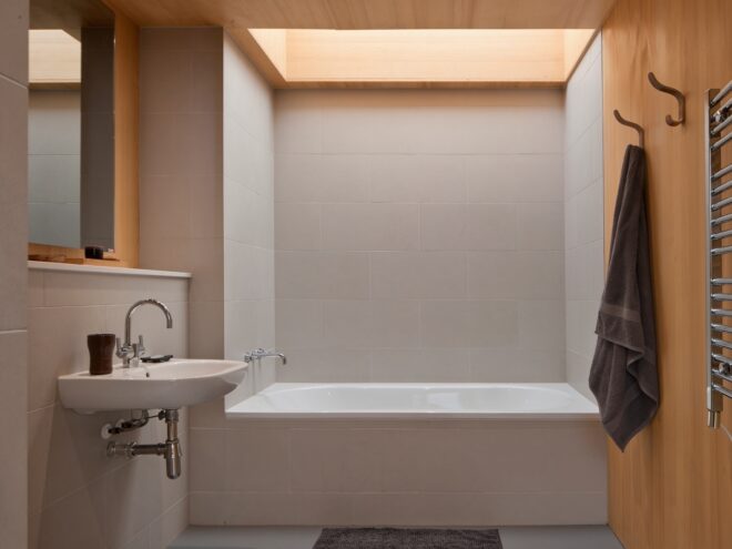bathroom with large white shower stall