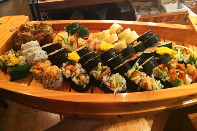 a platter with various kinds of sushi