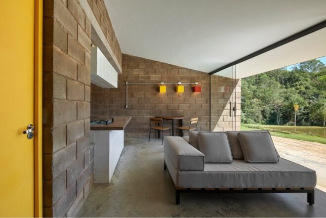 gray sofa in brick-lined room