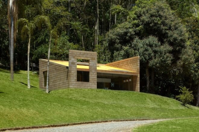 brick home with slanted roof