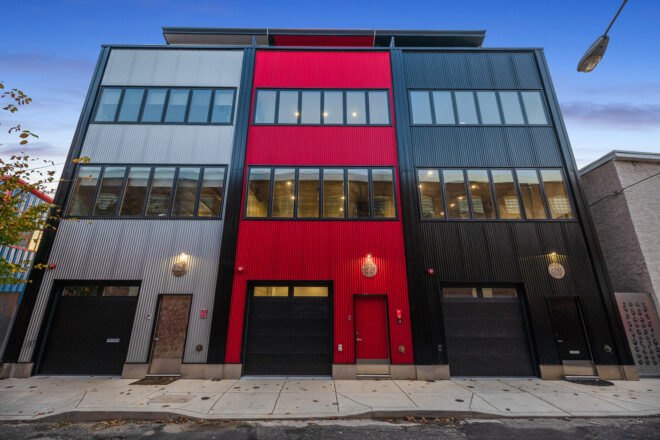 townhomes with gray, black and red exterior