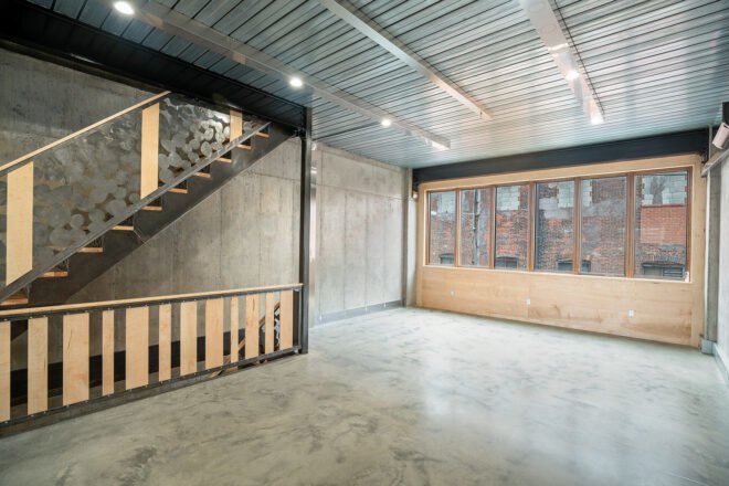 gray interiors with wood and metal staircase