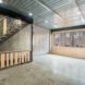 gray interiors with wood and metal staircase
