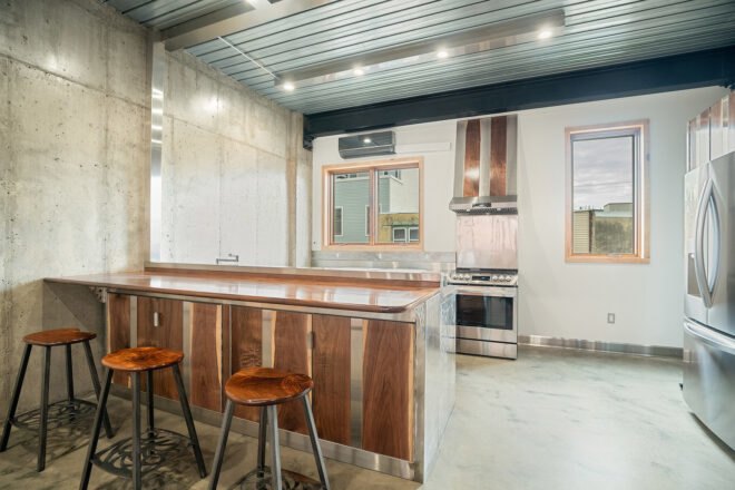 wood kitchen with barstools