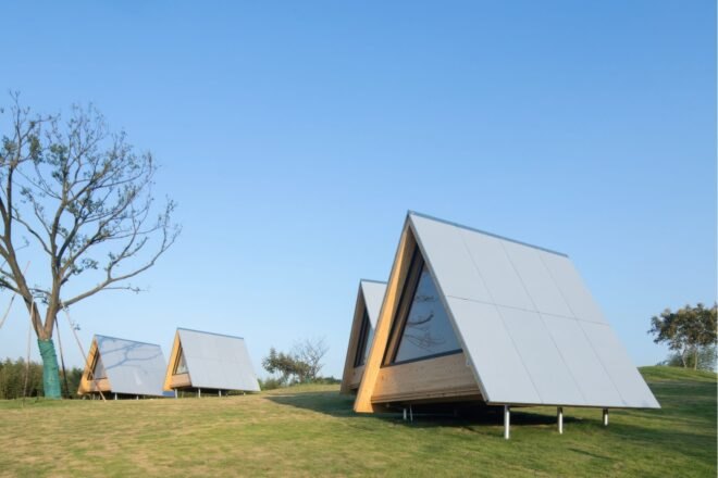 series of cabins with reflective exteriors