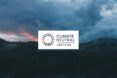 White Climate Neutral Certification logo on a mountainous background