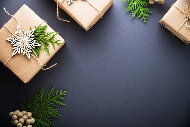 paper-wrapped gifts on dark background