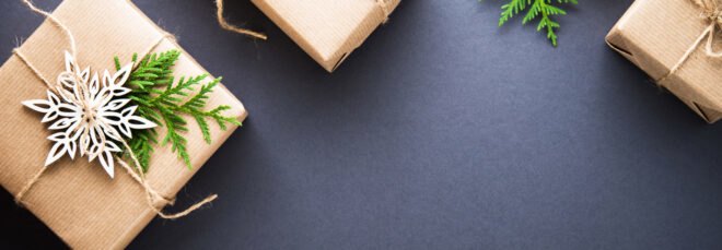 paper-wrapped gifts on dark background