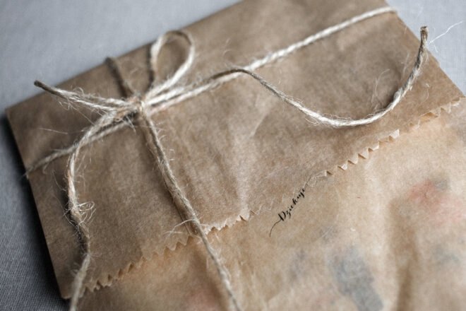 brown bag tied with brown string