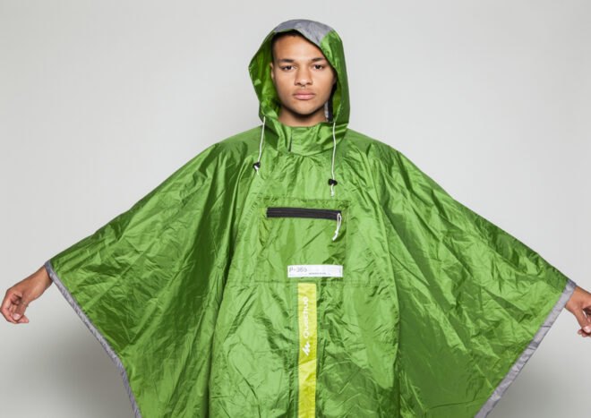 person wearing green poncho