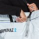 person opening white tote bag
