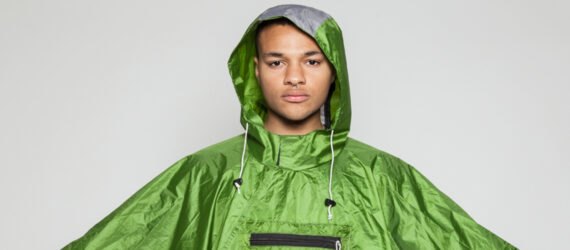 person wearing green poncho
