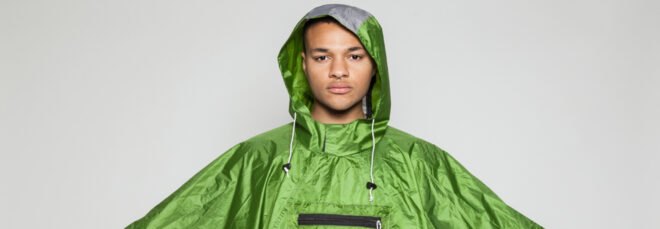 person wearing green poncho