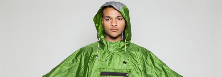 person wearing green poncho