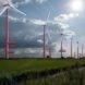 red wind turbines spelling out the word 