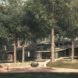 rendering of large wildlife center surrounded by trees