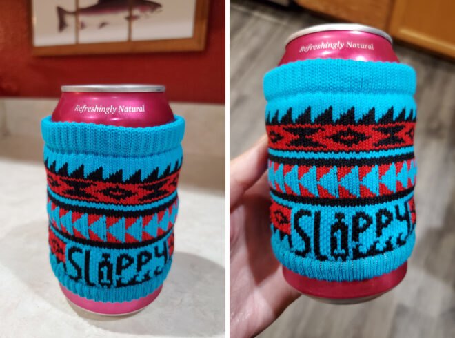 aluminum can wrapped in a blue cloth reusable cup sleeve