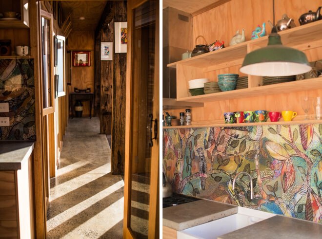 On the left, narrow hallway in wood home. On the right, kitchen with colorful backsplash and wood cabinets