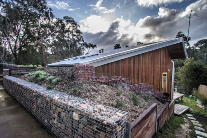 wood home with gabled roof