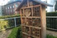 wooden bee hives on hotel deck