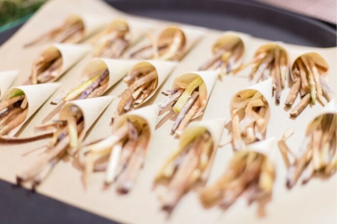 fried leeks on a tray