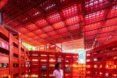 person inside plastic crate pavilion