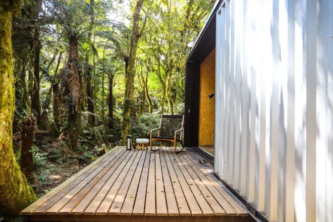 a cabin with wooden deck