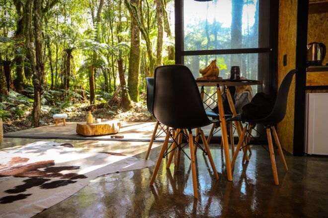 small dining set in front of wide opening