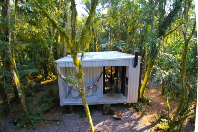 shot of cubed cabin clad in white
