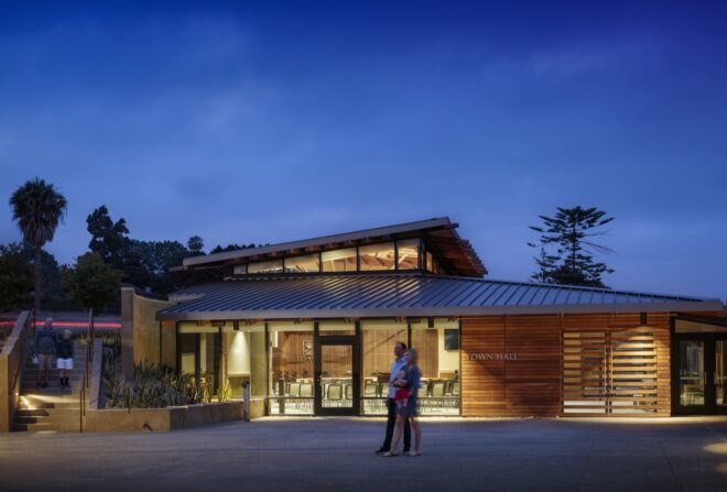 wood town hall building with angled roofs