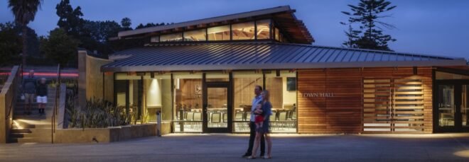 wood town hall building with angled roofs