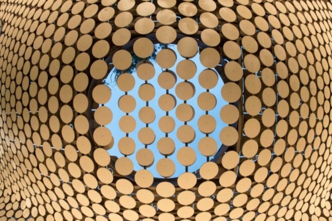 a close-up of the circular cut-outs that make up the interior walls