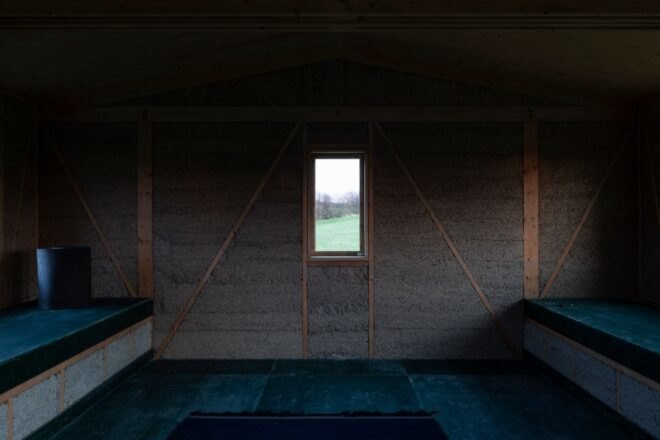 dark room with one small window