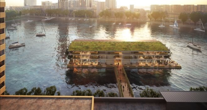 Rendering of floating office building with half a green roof and the other half of the roof covered in solar panels
