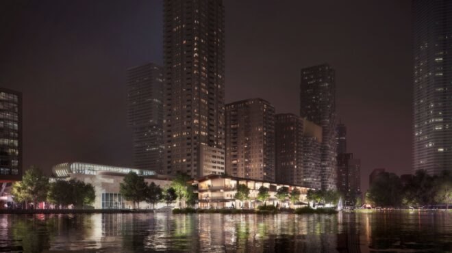 rendering of floating office building lit up at night