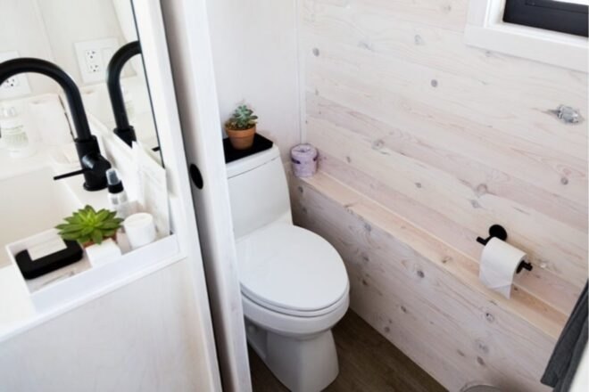 en suite bathroom with toilet in tiny home