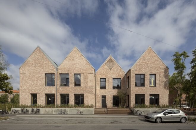 brick school building with multiple gables