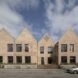 brick school building with multiple gables