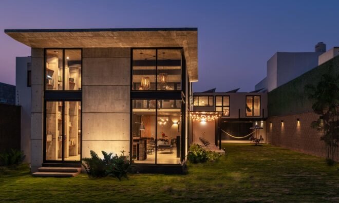 A large two story home in the evening time