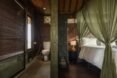 two images: one with bathroom and another with bed