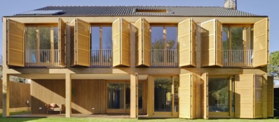 tan home with wood shutters