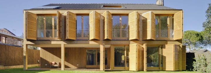tan home with wood shutters