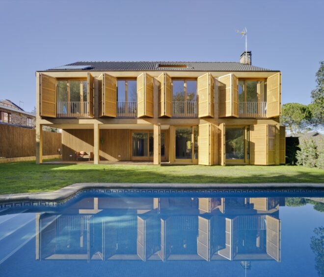 tan home with wood shutters