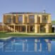 tan home with wood shutters