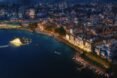 aerial rendering of floating garden and greenery against a lake