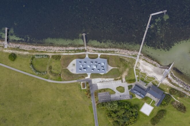 aerial view of gray building near the sea