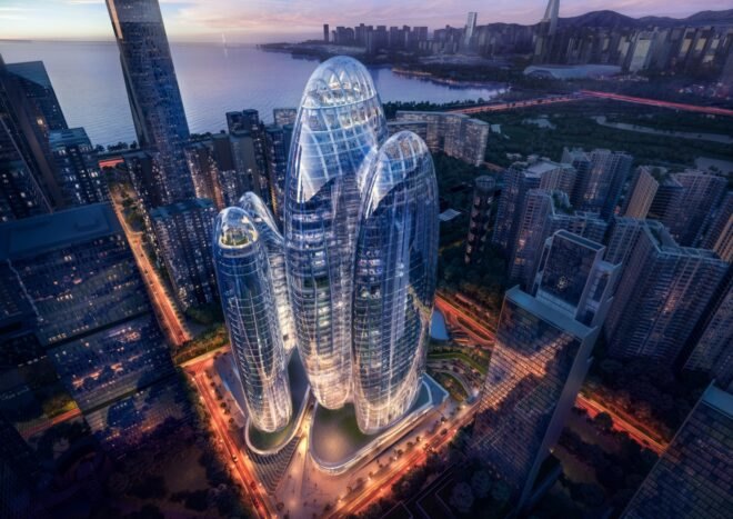 rendering of rounded towers with glass walls at night