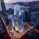 rendering of rounded towers with glass walls at night