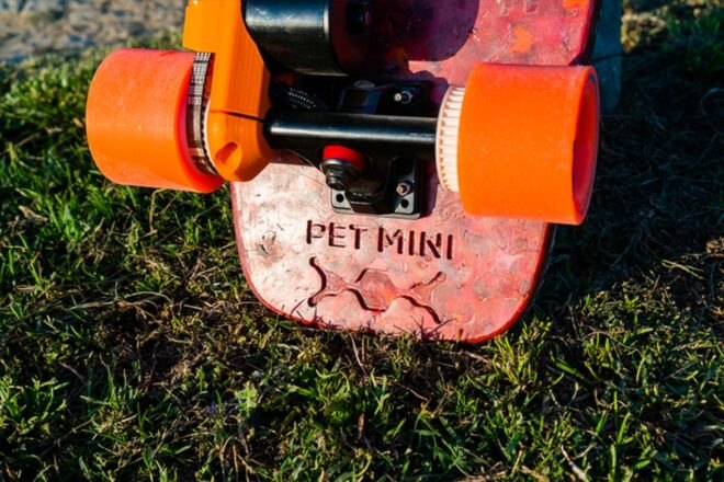 Orange underbelly of skateboard